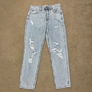 Light washed, high rise, distressed mom jean style. Worn only about 4-5 times.
